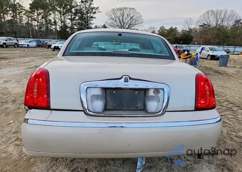 2001 Lincoln Town Car Cartier L z USA, uszkodzony, nr VIN 1LNHM85W61Y671920